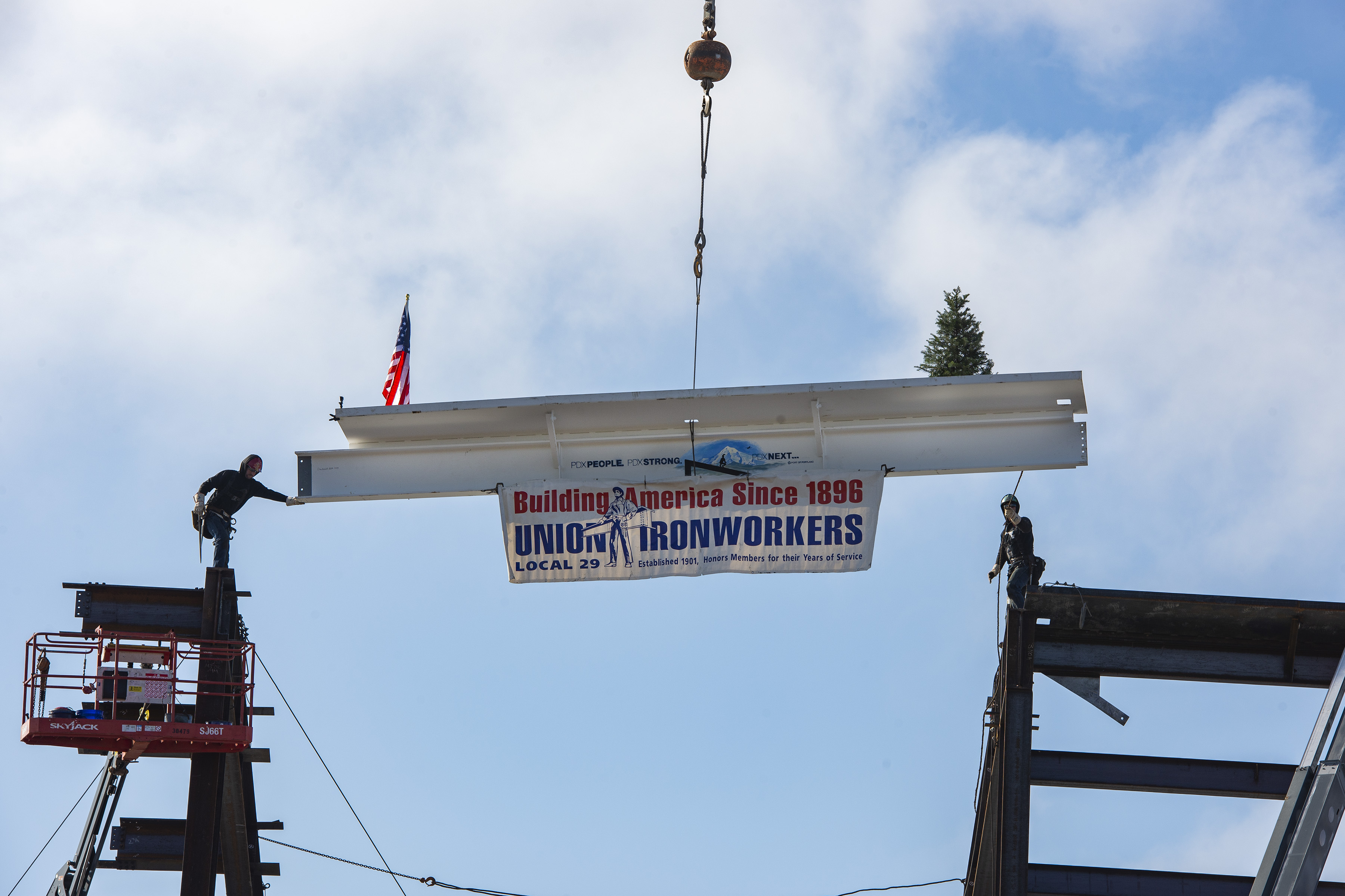 PDX Workers mark top of Concourse E